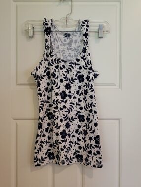 Small Floral Ruffle Racer Back tank top. White with blue